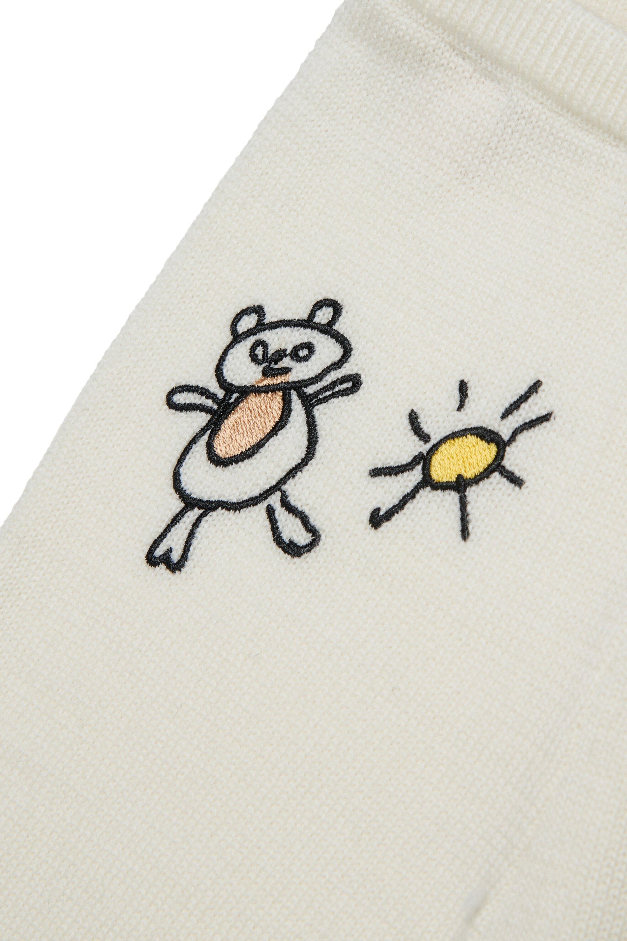Baby jumpsuit with front embroidery