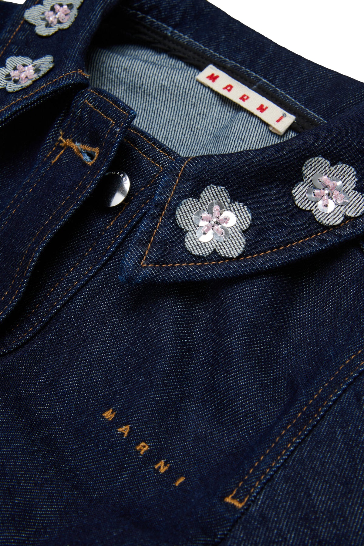 Denim jacket with floral collar