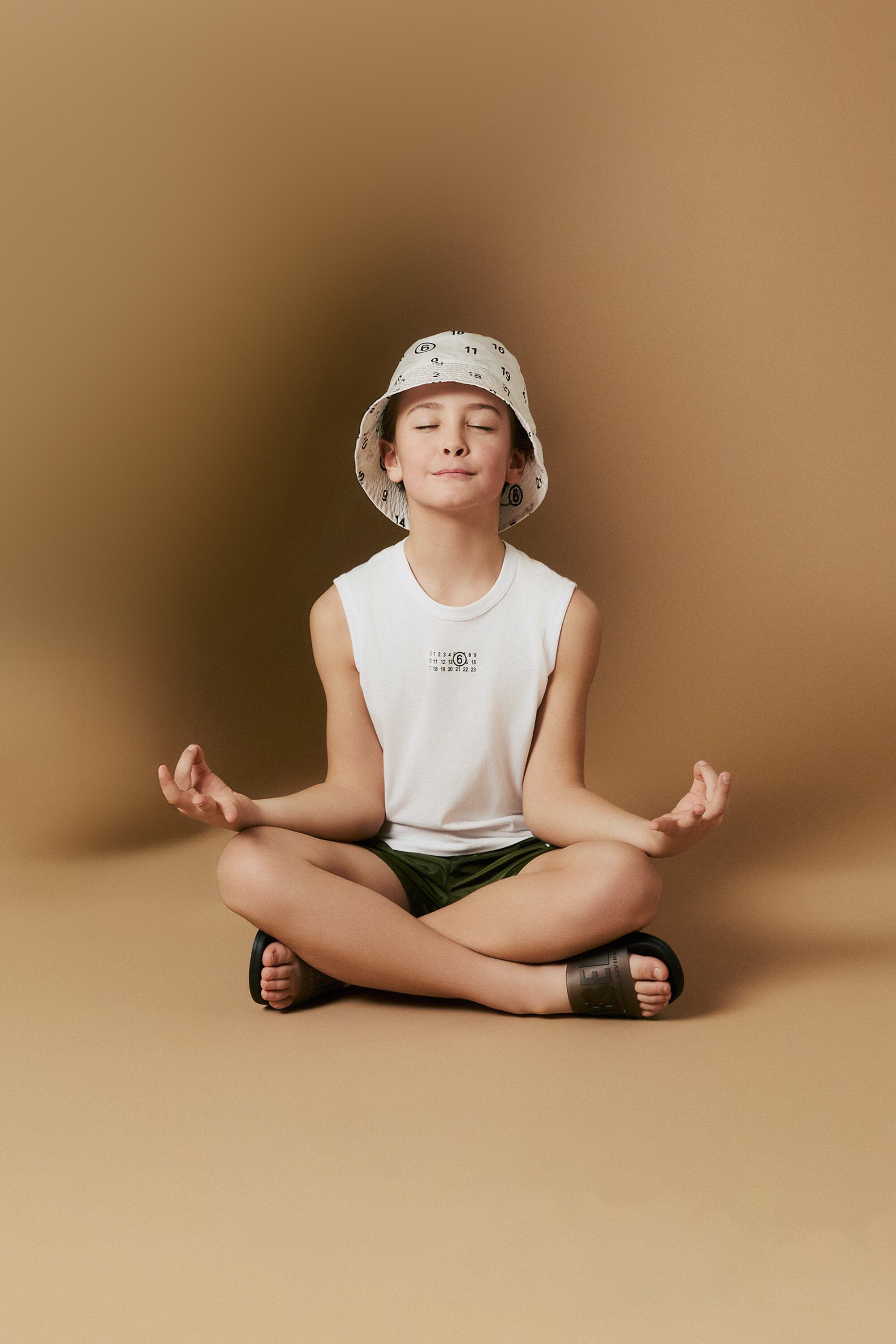 Sleeveless T-shirt branded with numeric logo