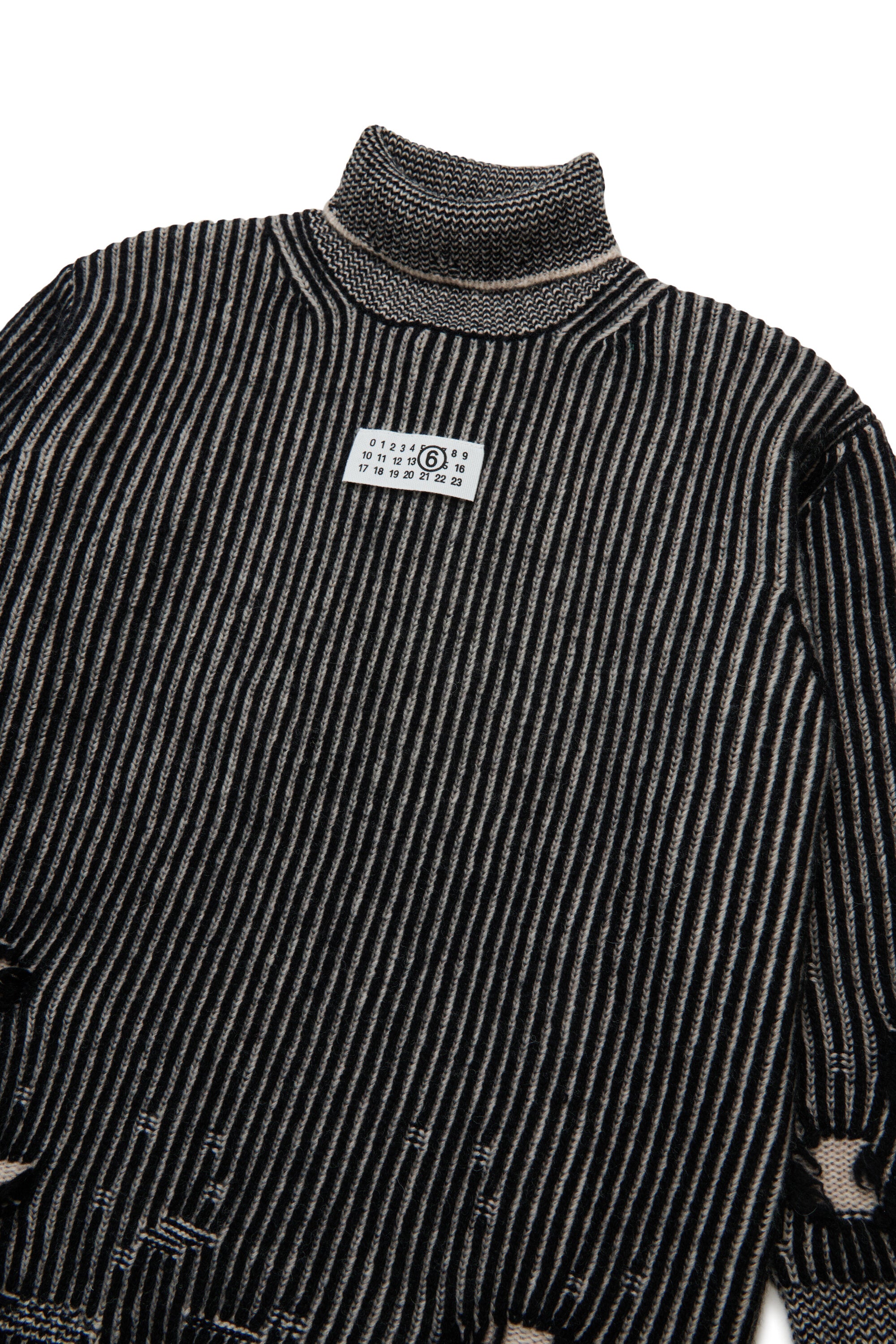 Ribbed wool mini dress with rips