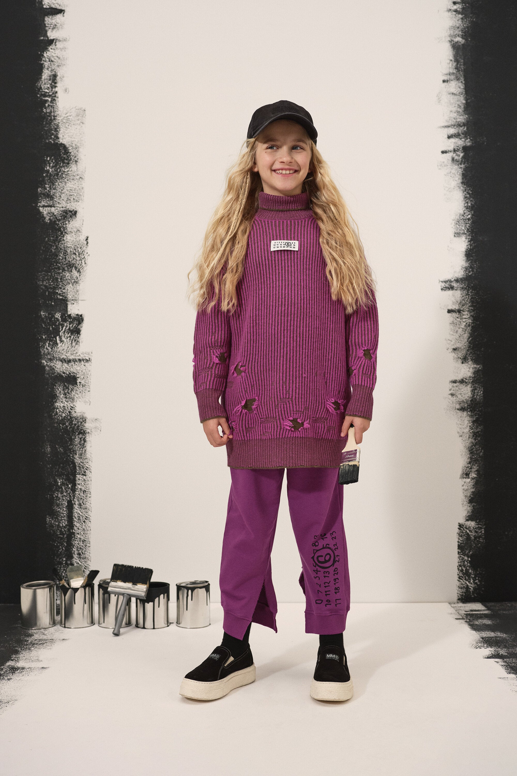 Ribbed wool mini dress with rips