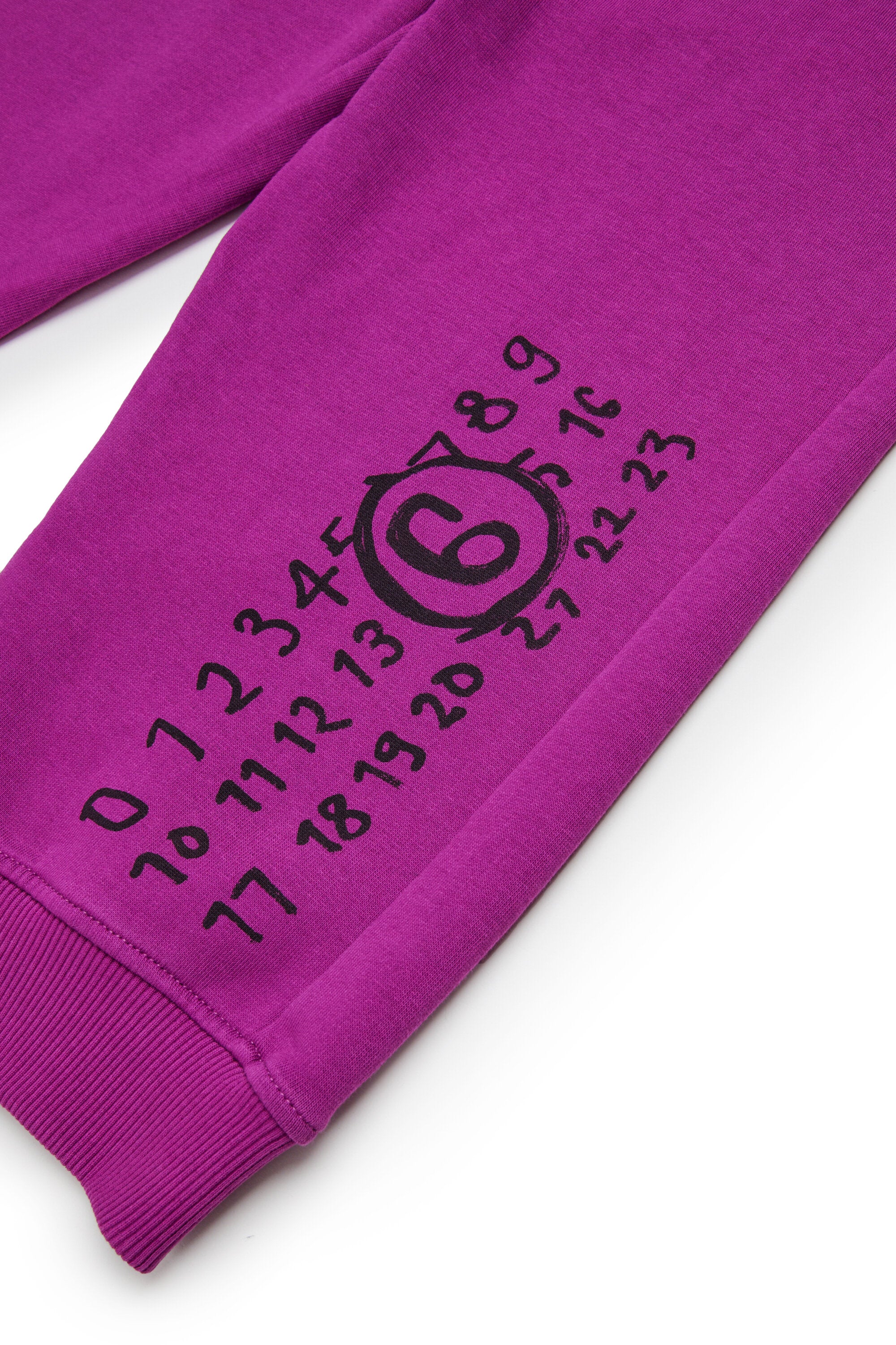 Split jogger pants branded with Hand Written logo