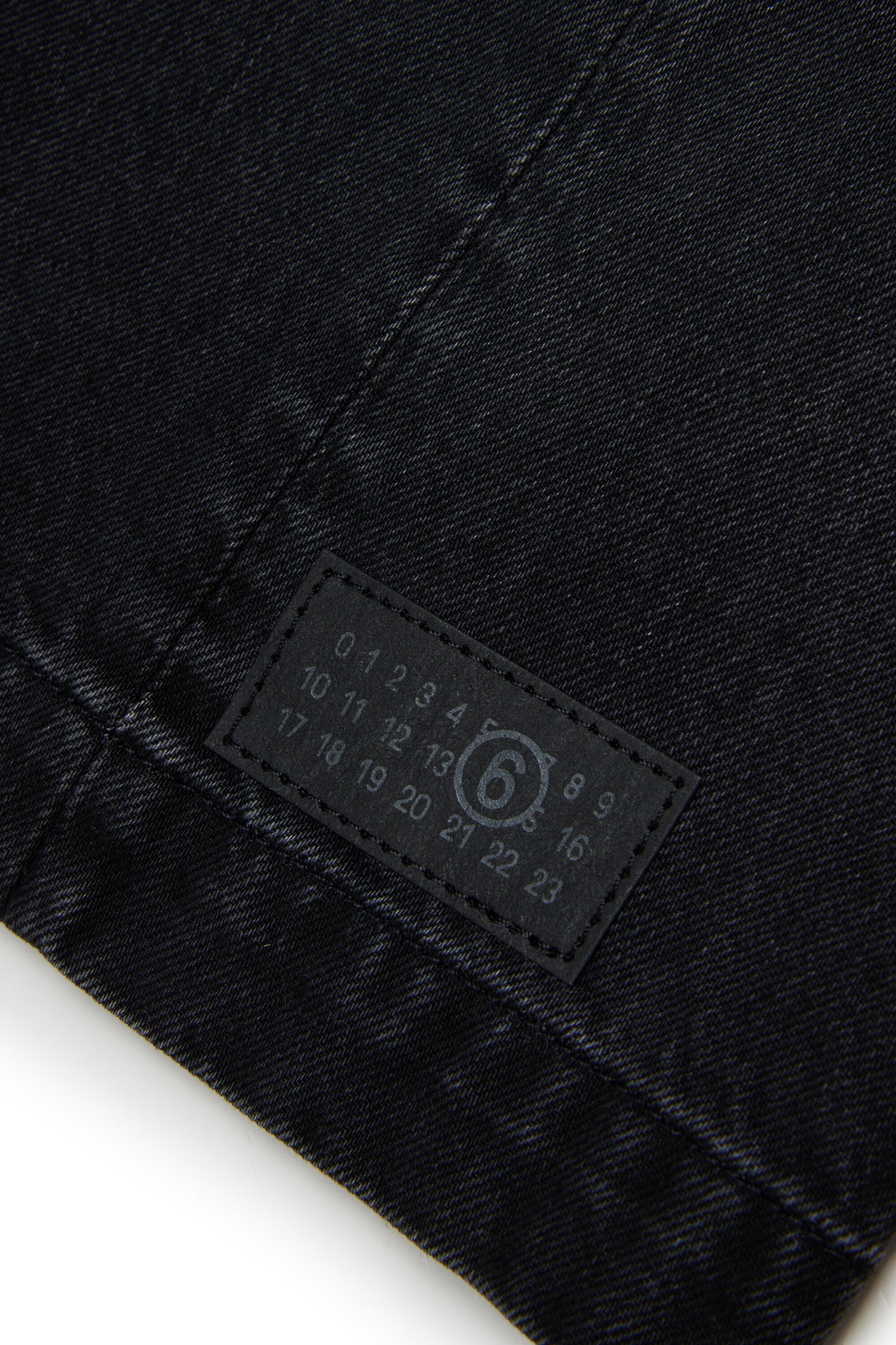 Sleeveless dress with used effect and logo