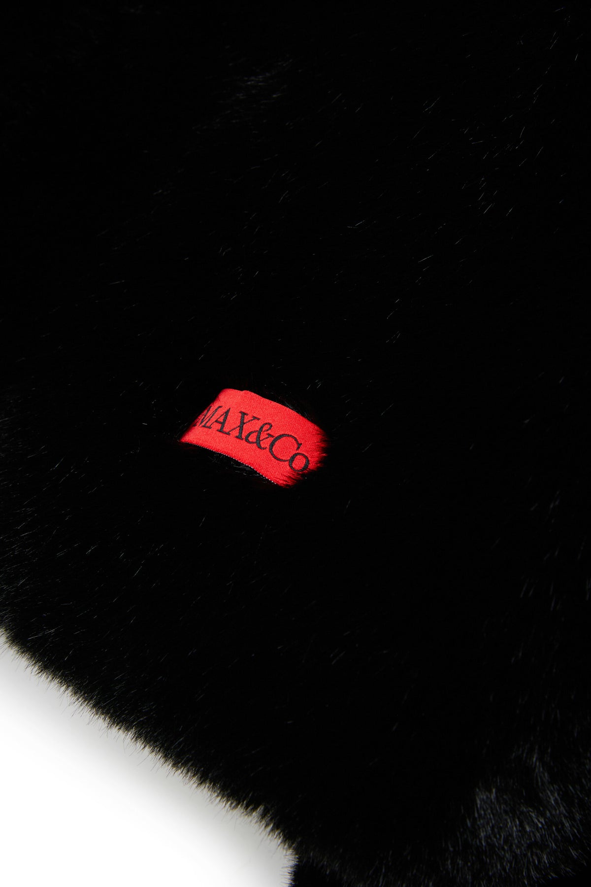 Faux fur jacket with logo