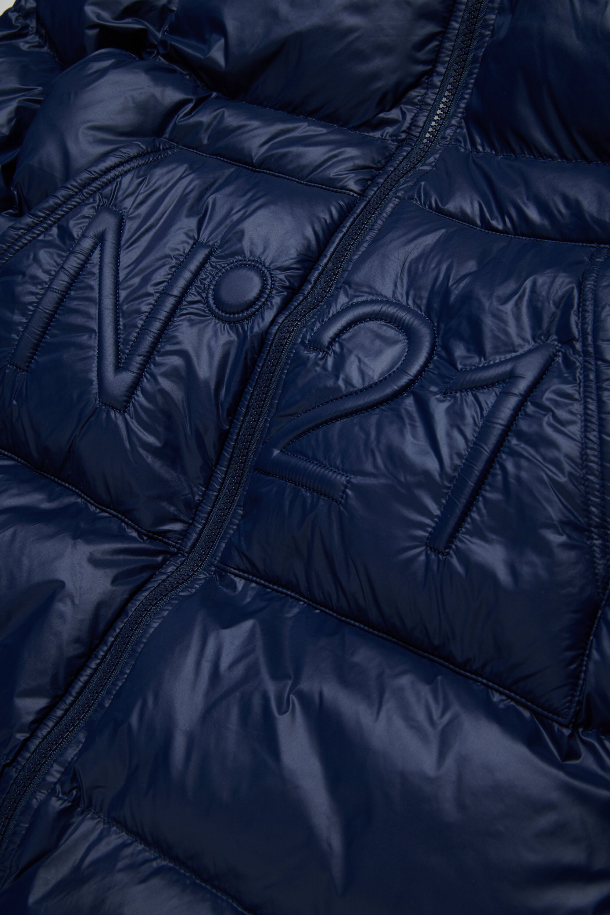 Long padded jacket with asymmetrical bottom