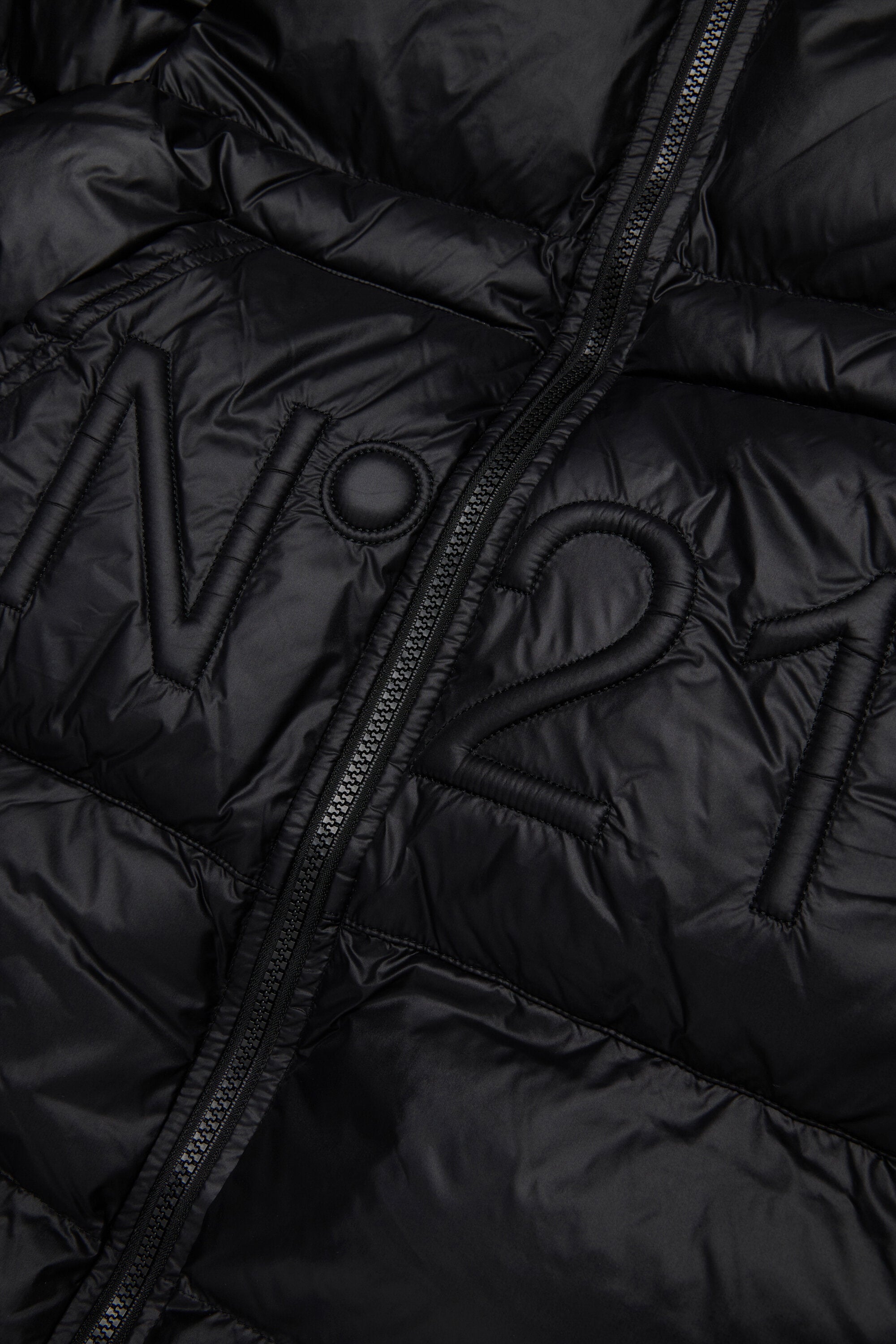 Long padded jacket with asymmetrical bottom