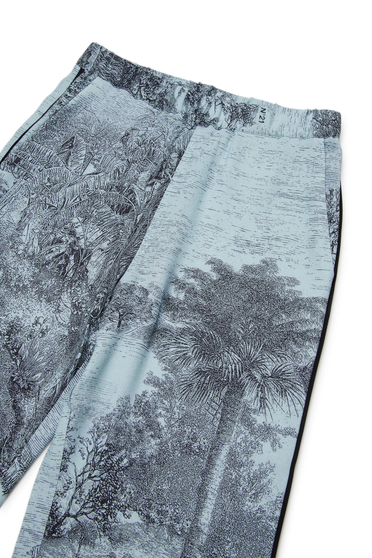 Trousers in fabric with printed pattern